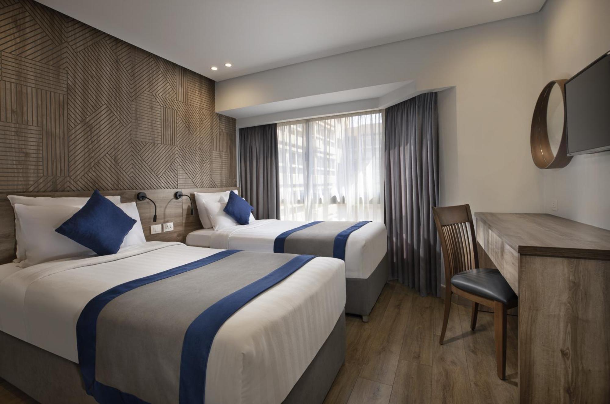 Pyramisa Suites Hotel Cairo Giza Exterior foto A room at the hotel